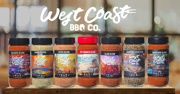 West Coast BBQ Co. spice blends on a wooden surface with a blurred background